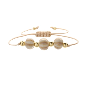 Handmade woven watermelon bead bracelet with adjustable cord and golden accents