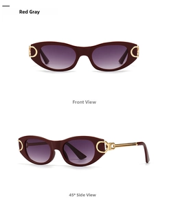 Close-up of red oval punk sunglasses featuring gold ring details and gradient lenses