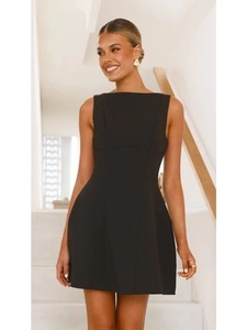 Detail of a sleek black sleeveless A-line dress with high round neck on a model