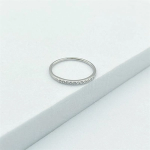 Macro shot of silver S925 sterling silver toe ring with sparkling pavé cubic zirconia
