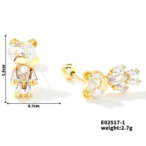 Detailed view of robot-shaped gold stud earrings with cubic zirconia and size dimensions