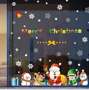 Vibrant Christmas window stickers featuring Santa, reindeer, and snowflakes on glass