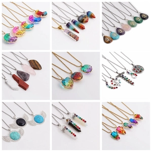 Detailed grid of crystal necklaces featuring star, moon and heart shaped stone pendants