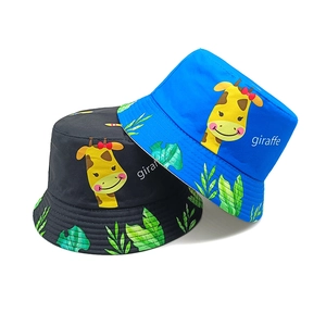 Kids bucket hats with cartoon giraffe print and tropical leaves in blue and black colors