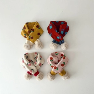 Kids knitted scarves in four colors featuring floral patterns and soft plush pom-pom decor