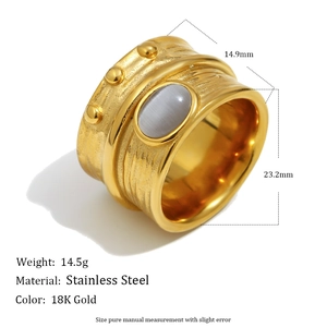 Bague large vintage en acier inoxydable doré 18 carats sertie d'un oeil de chat
