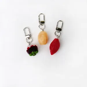 Cute realistic fruit and vegetable keychains featuring potato, mangosteen, and sweet potato