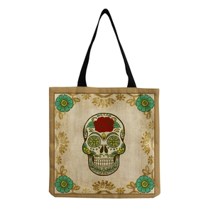 Detailed view of the woven canvas fabric texture and skull rose floral print on the tote bag