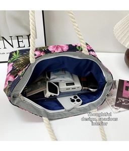 Top view of large capacity floral tote bag showing spacious interior with daily essentials