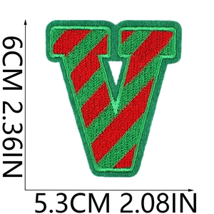 Detail size view of the letter V Christmas embroidery patch in red and green stripes