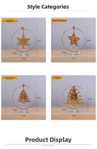 Close-up of golden metal Christmas ornaments with deer silhouettes and crystal bases