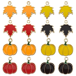Enamel maple leaf and pumpkin charms for DIY jewelry making in autumn colors