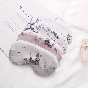Three silk sleep masks with landscape print in grey pink and lavender on white satin