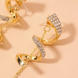 Boucles d'oreilles spirale serpent dorées avec strass et tiges en argent pur