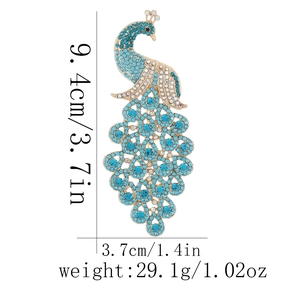 Peacock brooch dimensions 9.4x3.7cm and weight 29.1g with blue rhinestones on gold base