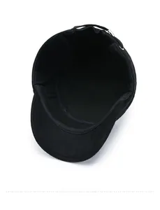 Internal view of the thick winter flat top cap showing lining and ear protection flap