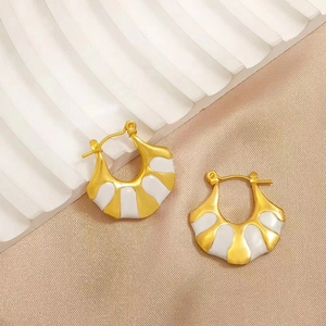 Gold-plated stainless steel fan-shaped enamel earrings with white detailing on silk texture