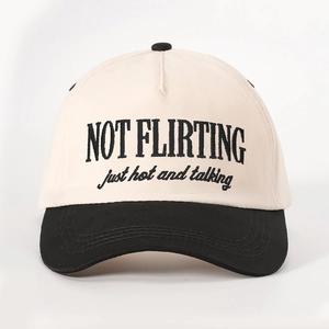 Two-tone beige and black cotton baseball cap with NOT FLIRTING embroidery detail