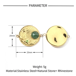 Detailed view of sun and moon pendant with green stone, dimensions 20mm by 25mm