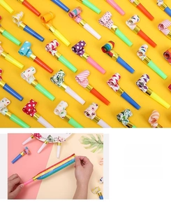 Detail showing the extended stretching length of colorful party blowouts with patterns