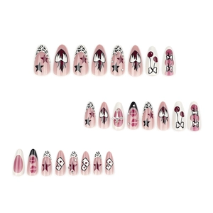 Y2K almond press-on nails set featuring pink hearts, leopard print, and metallic crosses
