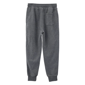 Detail of dark grey jogger pants showing the back pocket and ribbed ankle cuffs