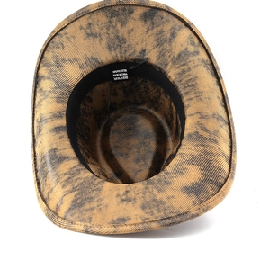 Detail of 100% polyester cowboy hat interior showing sweatband and wash care label