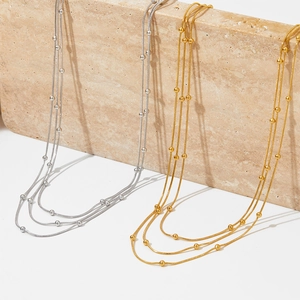 Ensemble de colliers multicouches en acier inoxydable doré et argenté avec perles