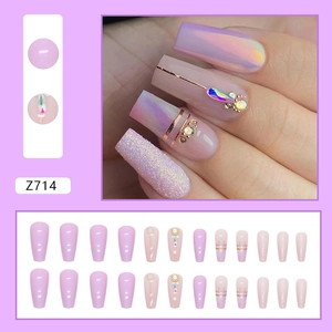 Medium ballerina nails in taro purple aurora style with rhinestones and glitter finish