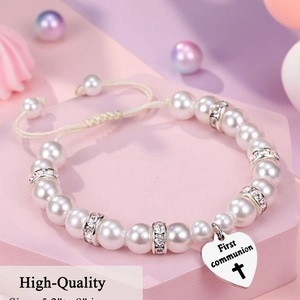 White faux pearl religious bracelet with adjustable cord and First Communion cross heart charm