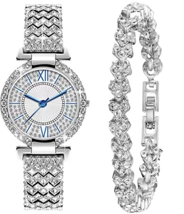 Detailed close-up of luxury silver quartz watch with pavé diamonds and heart bracelet set