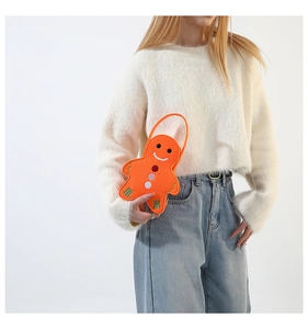 Gingerbread man felt tote bag carried by model for Christmas festive decoration