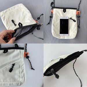Detail view of mini crossbody bag showing inner lining and adjustable rope strap