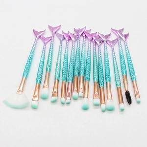16-piece mermaid tail makeup brush set with purple cyan gradient handles and rose gold tubes