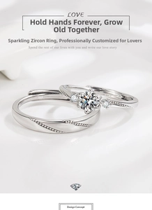 Detailed view of adjustable couple rings with cubic zirconia inlay and engraved accents