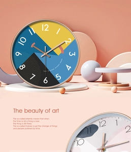 Close-up of minimalist geometric clock face with metal hands and silent movement detail