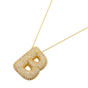 Detailed view of large bubble letter B pendant with micro-paved cubic zirconia stones