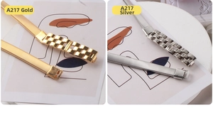 Detail of mesh and square link metal waist chains in gold and silver finishes