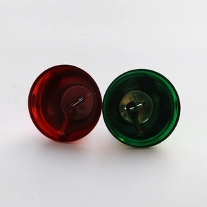 Close-up of 38mm thickened metal bells in festive red and green for Christmas decoration