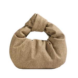 Minimalist khaki twill knot handbag with retro half-moon design and soft textured finish