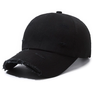 Distressed black cotton baseball cap with ripped details and vintage washed style