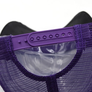 Detail of adjustable snapback closure on purple mesh baseball cap for custom fit