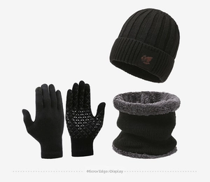 Detailed view of black knitted winter set with thick fleece lining and touch-screen gloves