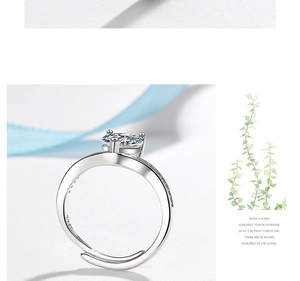 Detail of S925 sterling silver ring featuring a heart-shaped zircon and hallmark stamp