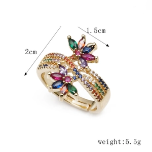 Detail of 18K gold plated wing ring with marquise-cut colorful zircons in flower pattern