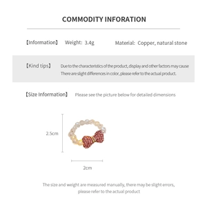 Detailed size specifications for the pink rhinestone bow ring with copper and natural stone