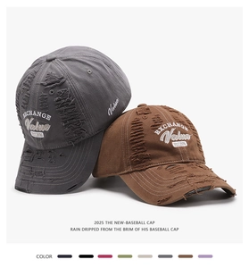 Close-up of distressed baseball caps with heavy fraying and 3D embroidery detail