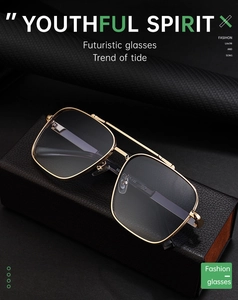 Macro shot of gold metal frames and hinge details on vintage square sunglasses
