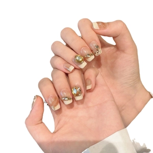 French champagne press-on nails with maple leaf gold foil and sparkling rhinestones