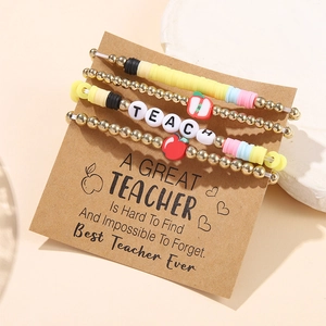 Detailed set of colorful TEACH teacher appreciation bracelets on a craft display card